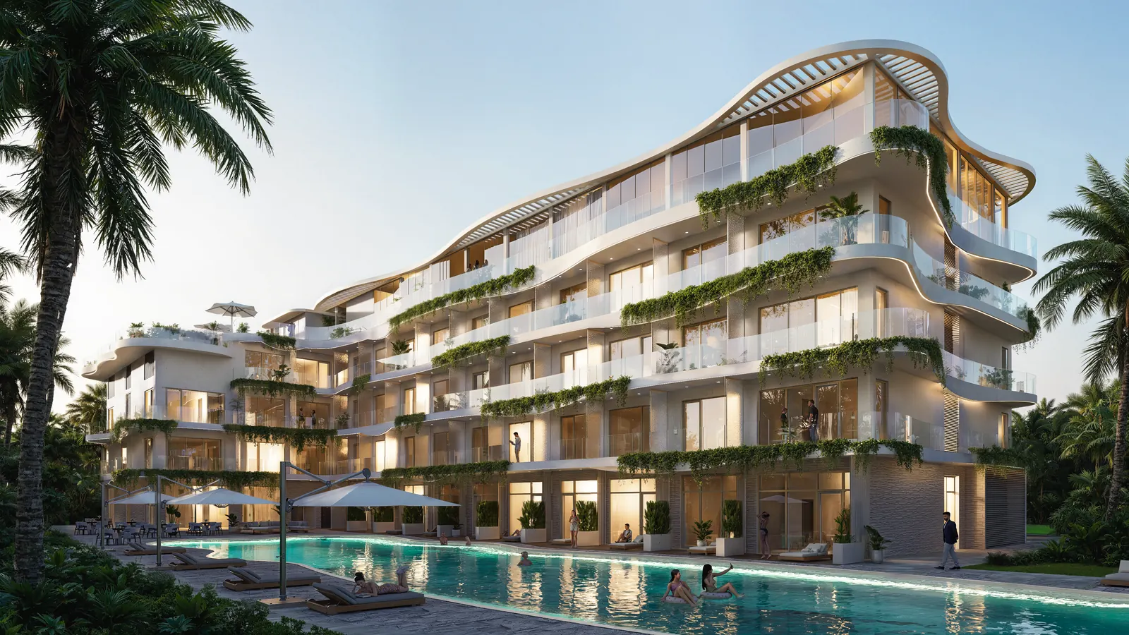 Вечерний бассейн и фасад комплекса Ramada Residences